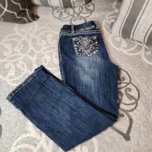 Denim straight leg jeans with slight flair.